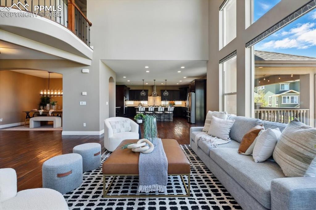 4577 Outlook Ridge Trail Colorado Springs, CO 80924 - Photo 3 of 45 a living room with furniture and a large window