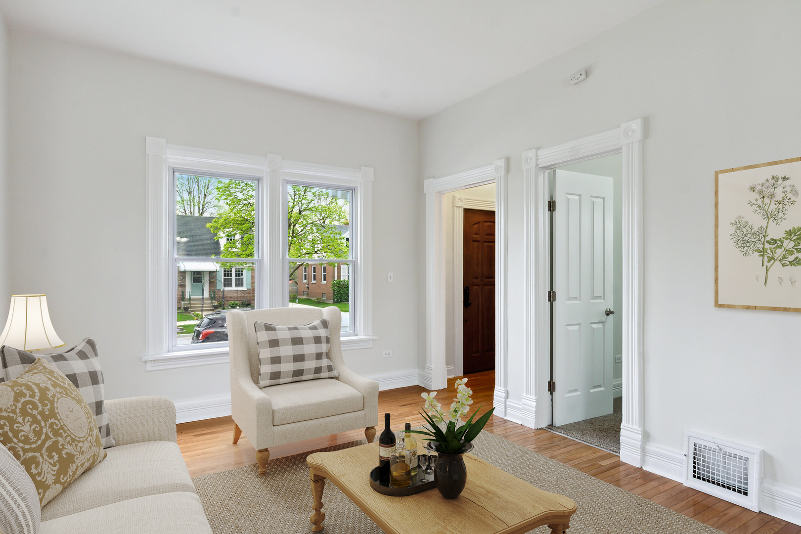 9430 Jackson Avenue Brookfield, IL 60513 - Photo 3 of 17 a living room with furniture and a large window