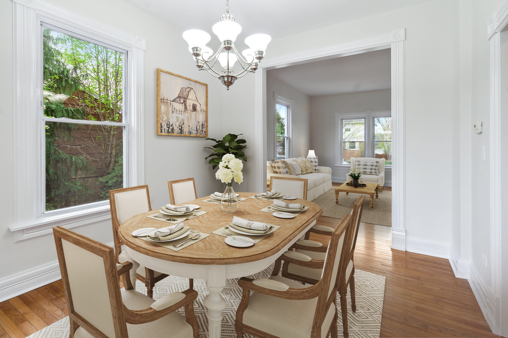 9430 Jackson Avenue Brookfield, IL 60513 - Photo 4 of 17 a view of a dining room with furniture a chandelier and wooden floor