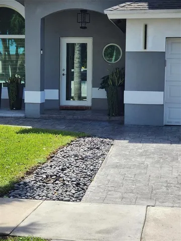 a view of a entryway door front of house