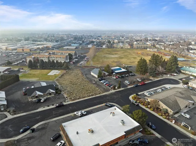 an aerial view of a house with a ocean view