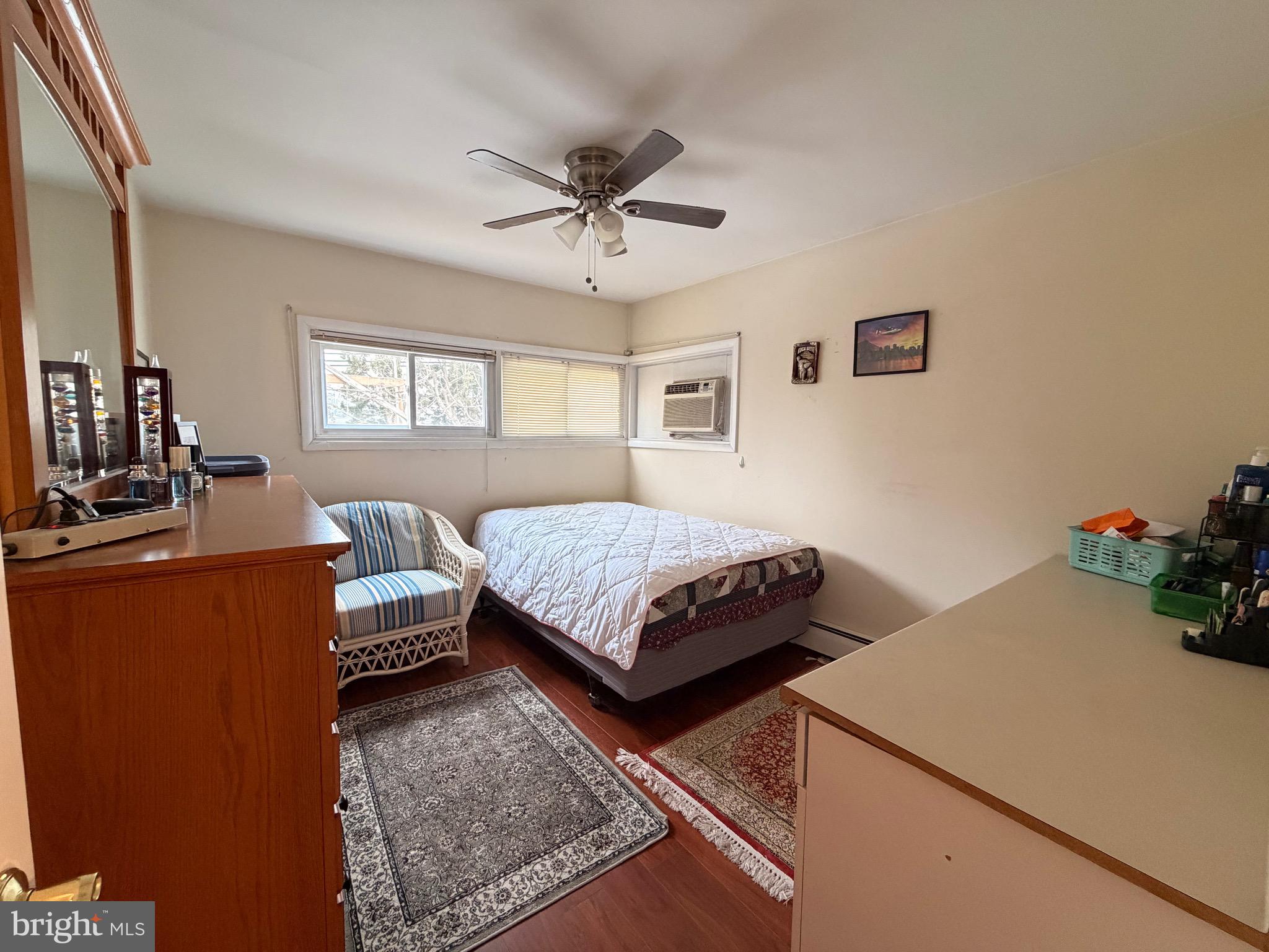 25 Balsam Road Levittown, PA 19057 - Photo 13 of 17 a bedroom with a bed and window