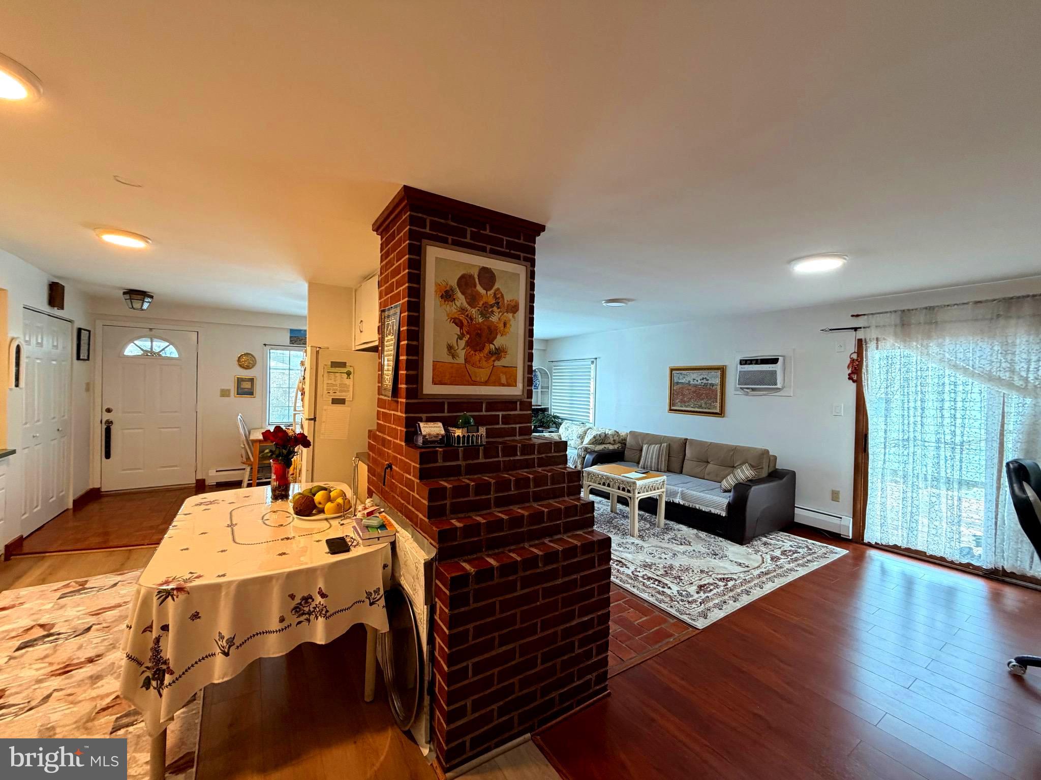 25 Balsam Road Levittown, PA 19057 - Photo 4 of 17 a living room with furniture and a wooden floor