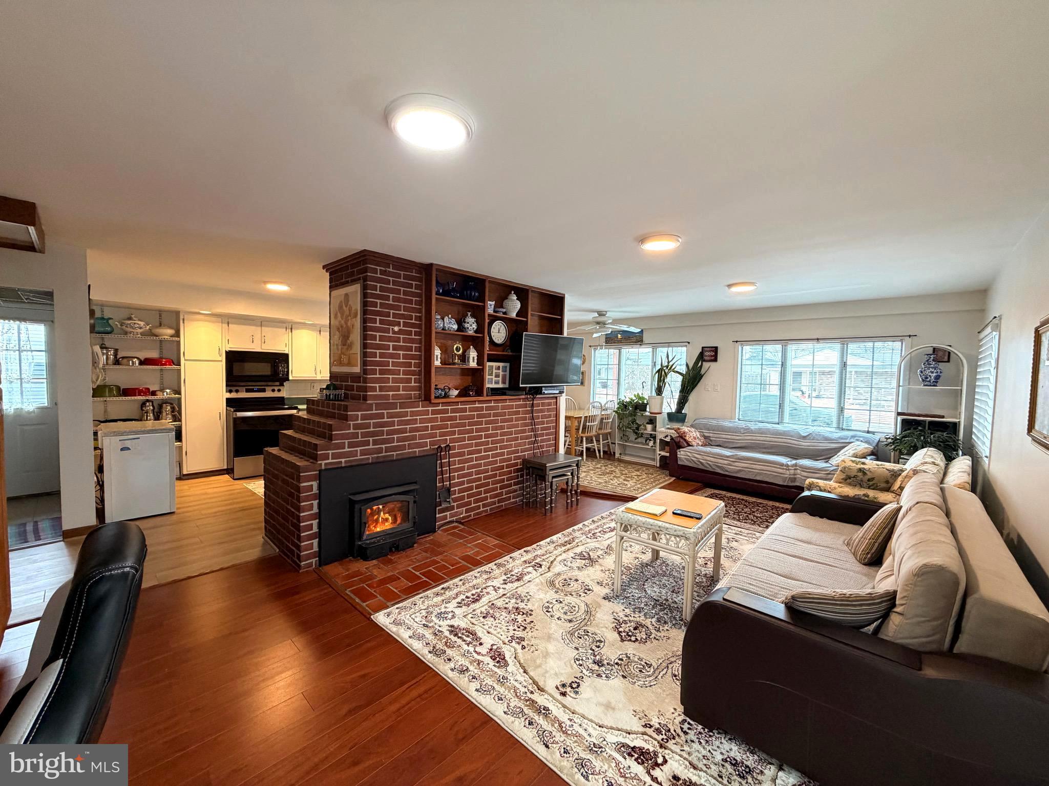 25 Balsam Road Levittown, PA 19057 - Photo 5 of 17 a living room with furniture and a wooden floor