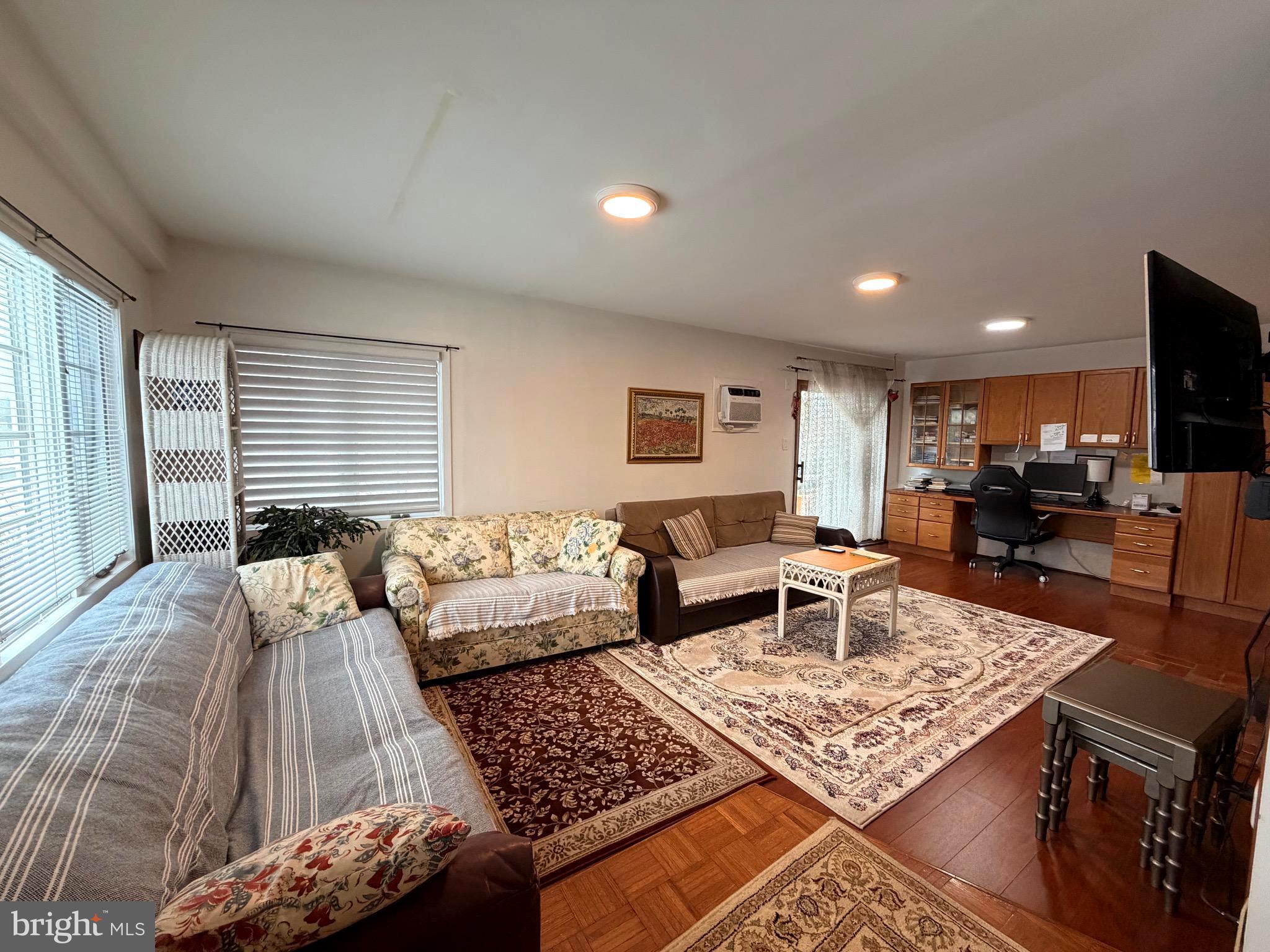 25 Balsam Road Levittown, PA 19057 - Photo 7 of 17 a living room with furniture and a flat screen tv