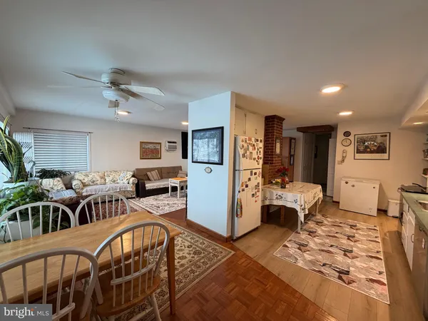 a very nice looking living room with furniture and a large window