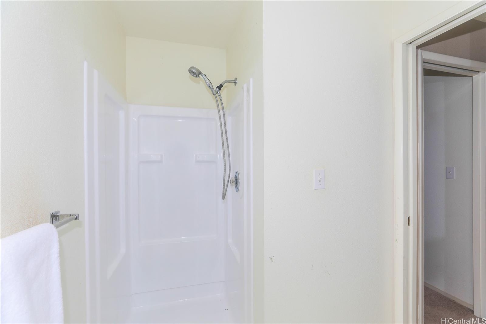 94-508 Kupuohi Street, Unit 8103 Waipahu, HI 96797 - Photo 13 of 19 a bathroom with a shower