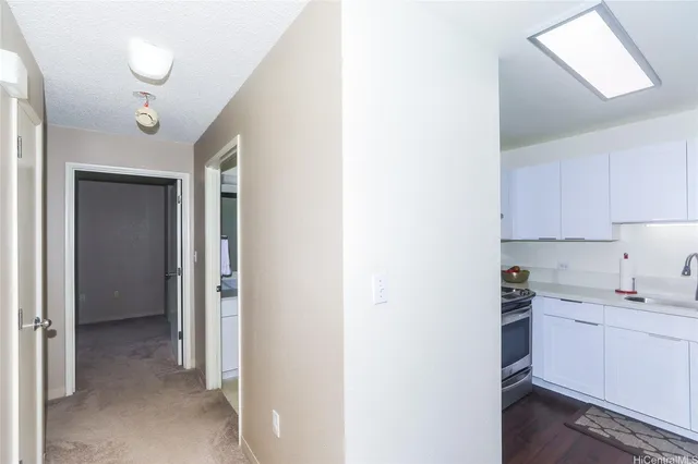 a view of a kitchen with a sink