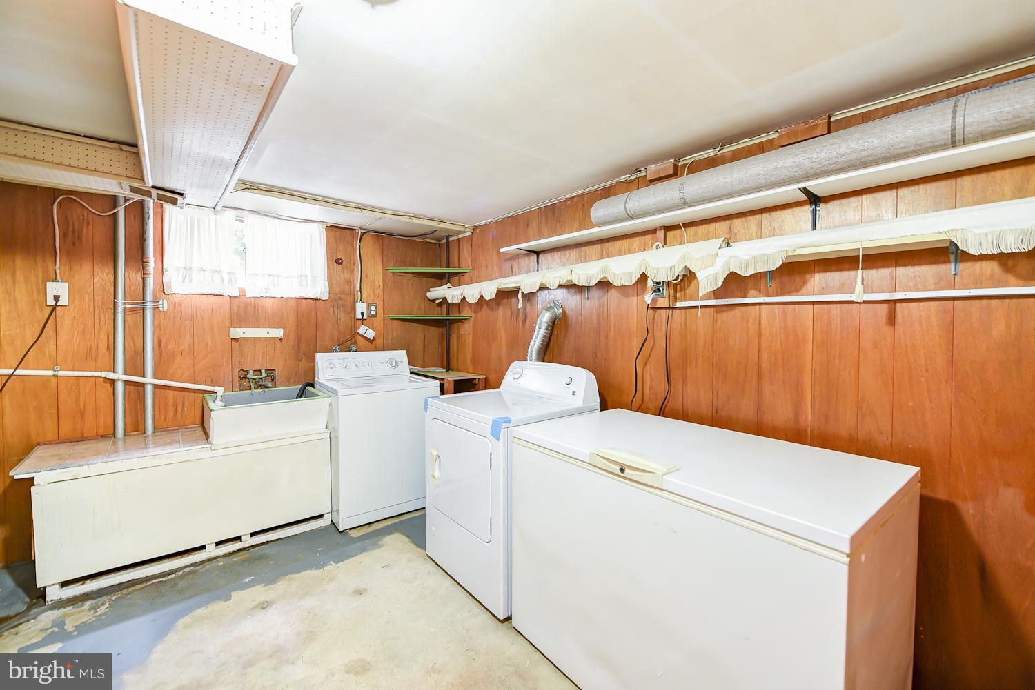 12816 Matey Road Silver Spring, MD 20906 - Photo 20 of 30 a utility room with dryer and washer