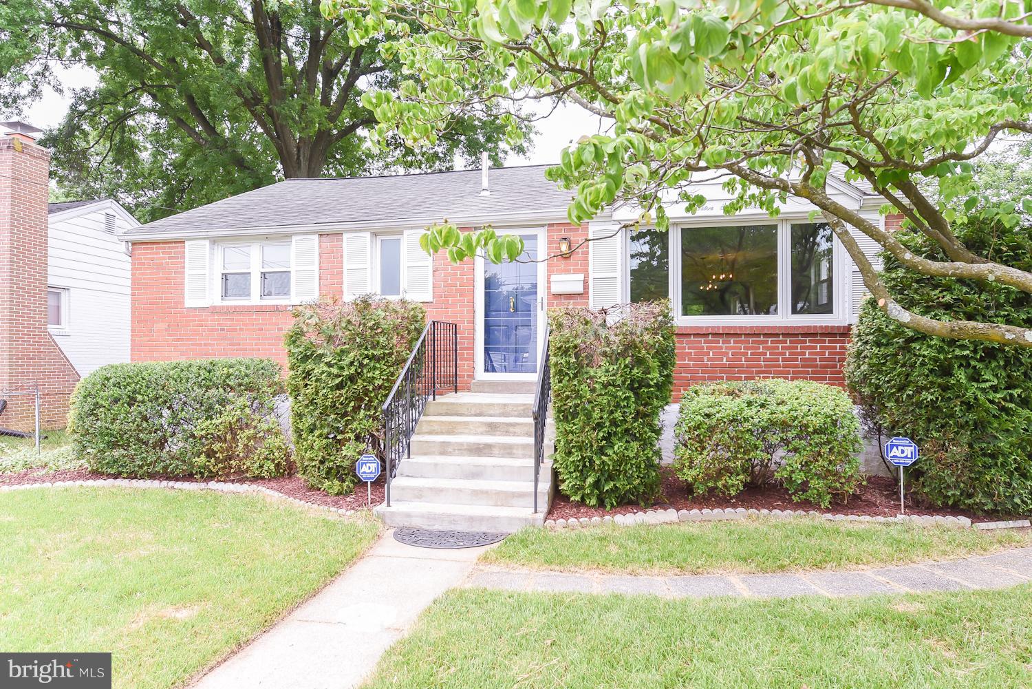12816 Matey Road Silver Spring, MD 20906 - Photo 22 of 30 a front view of a house with a yard