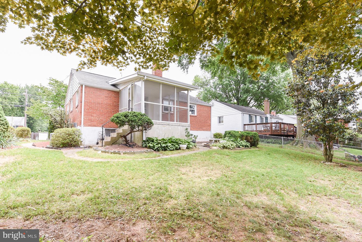 12816 Matey Road Silver Spring, MD 20906 - Photo 27 of 30 a front view of a house with garden