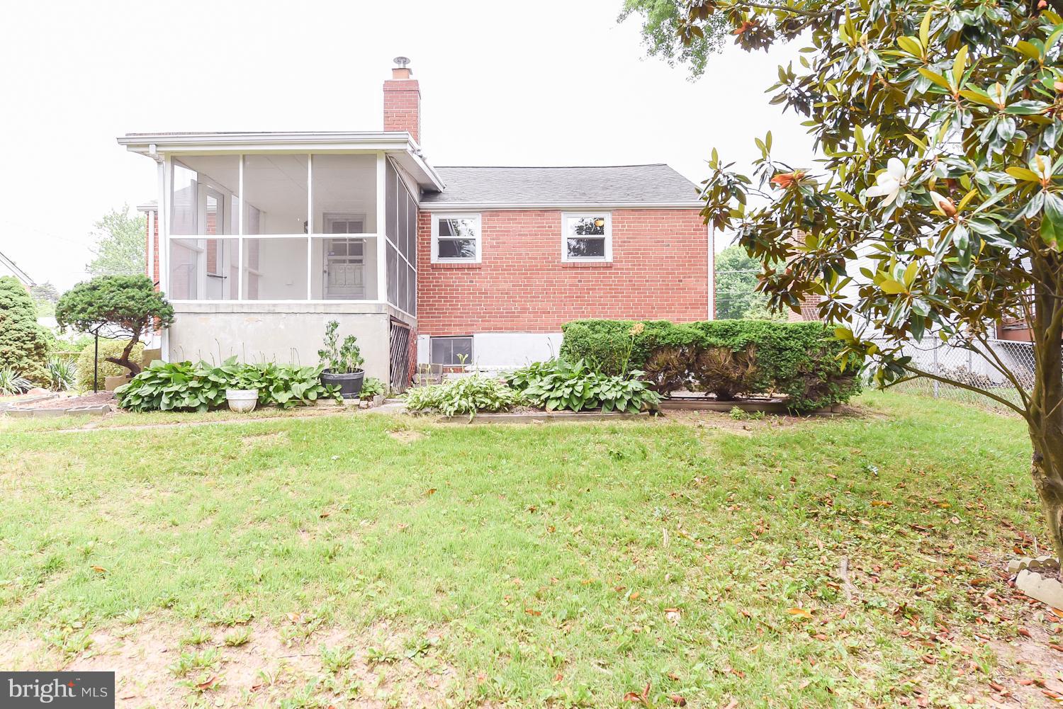 12816 Matey Road Silver Spring, MD 20906 - Photo 28 of 30 a front view of a house with a yard