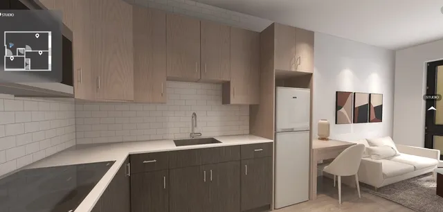 a view of a hallway with a bathroom and a sink