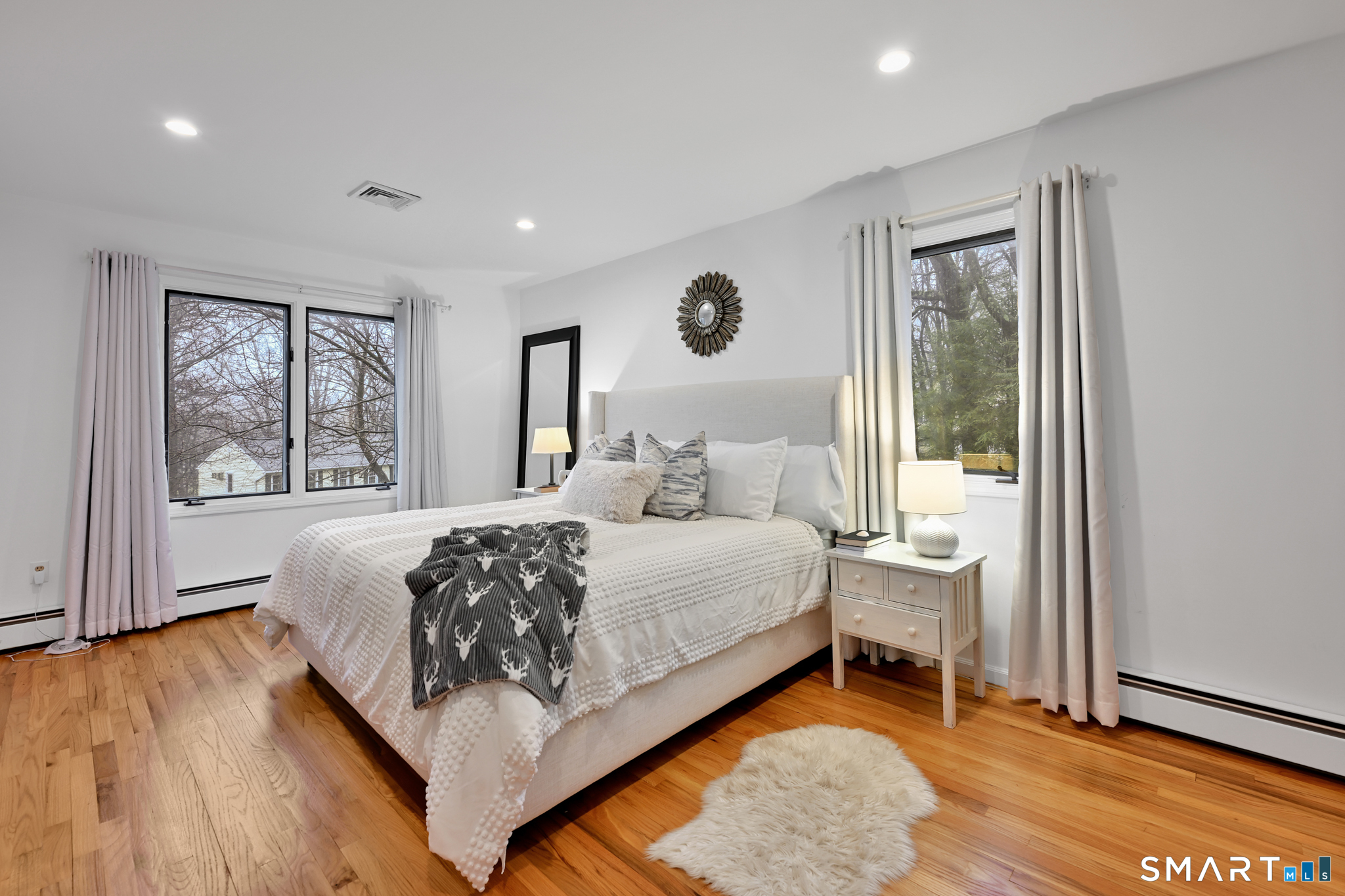 117 Settlers Farm Road Monroe, CT 06468 - Photo 17 of 40 The primary suite is a generously sized room that features hardwood floors.