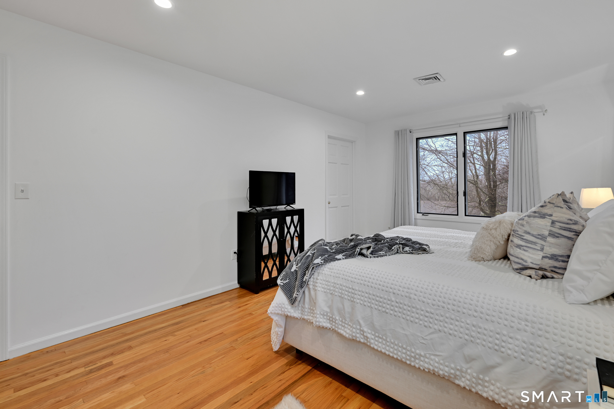 117 Settlers Farm Road Monroe, CT 06468 - Photo 20 of 40 The room has an abundance of natural light from the large windows.