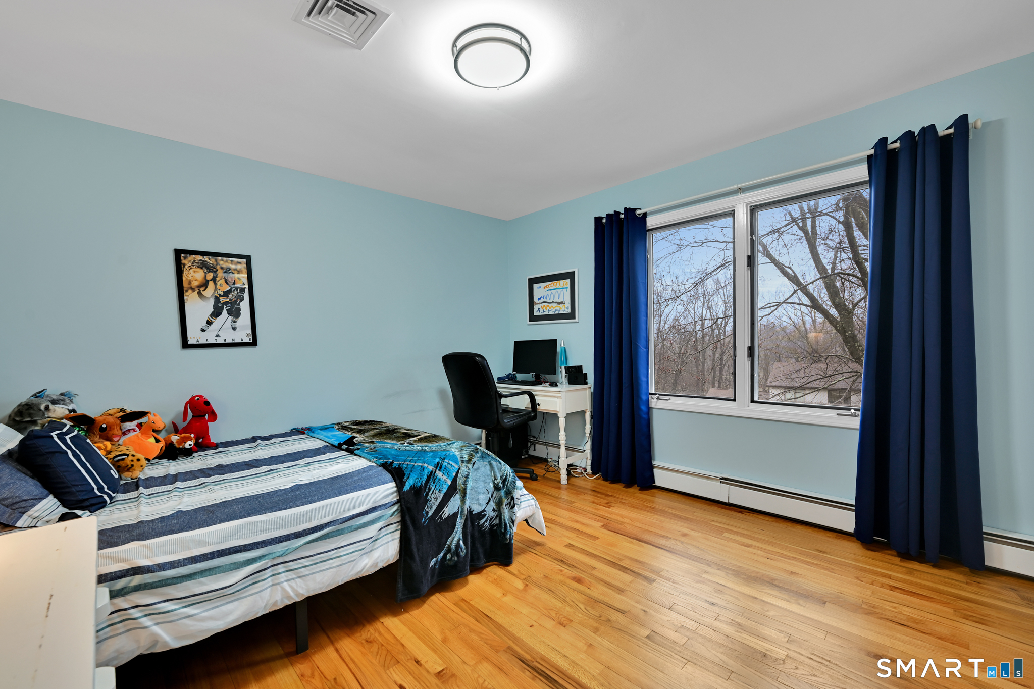 117 Settlers Farm Road Monroe, CT 06468 - Photo 23 of 40 The space has a large window and hardwood floors.