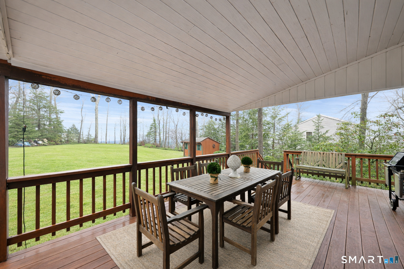 117 Settlers Farm Road Monroe, CT 06468 - Photo 28 of 40 Enjoy the oversized covered porch that serves as an inviting transition between the indoors and the natural beauty of the backyard.