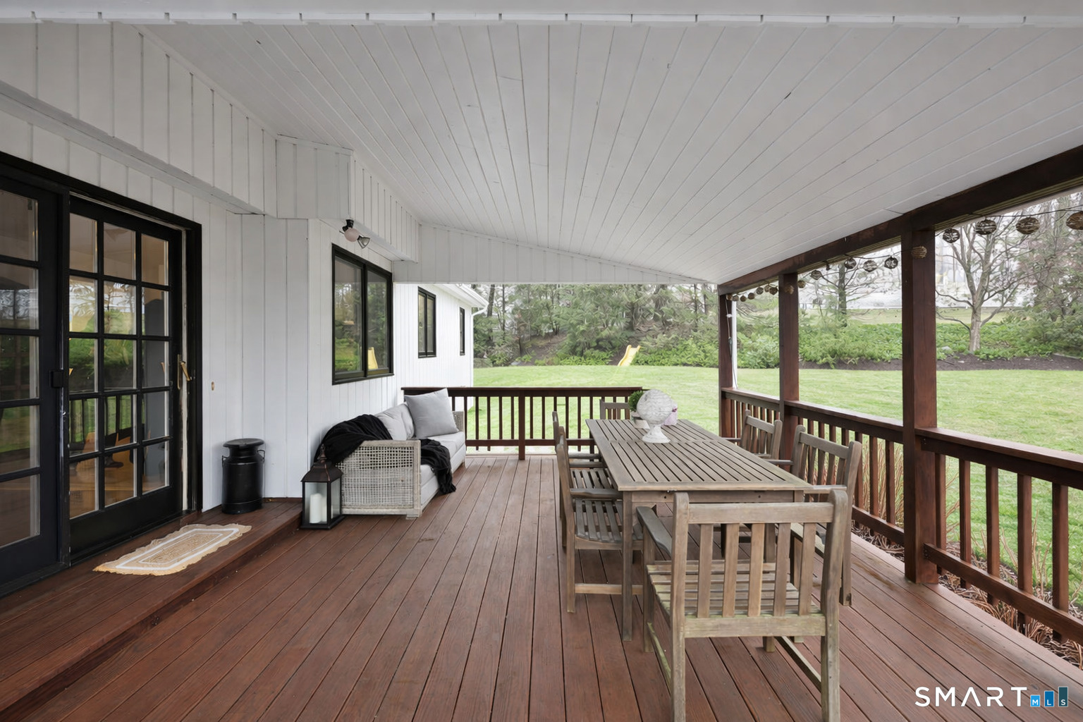 117 Settlers Farm Road Monroe, CT 06468 - Photo 29 of 40 The porch is strategically positioned with sliders that lead to the family room and kitchen, enhancing the flow of the home.