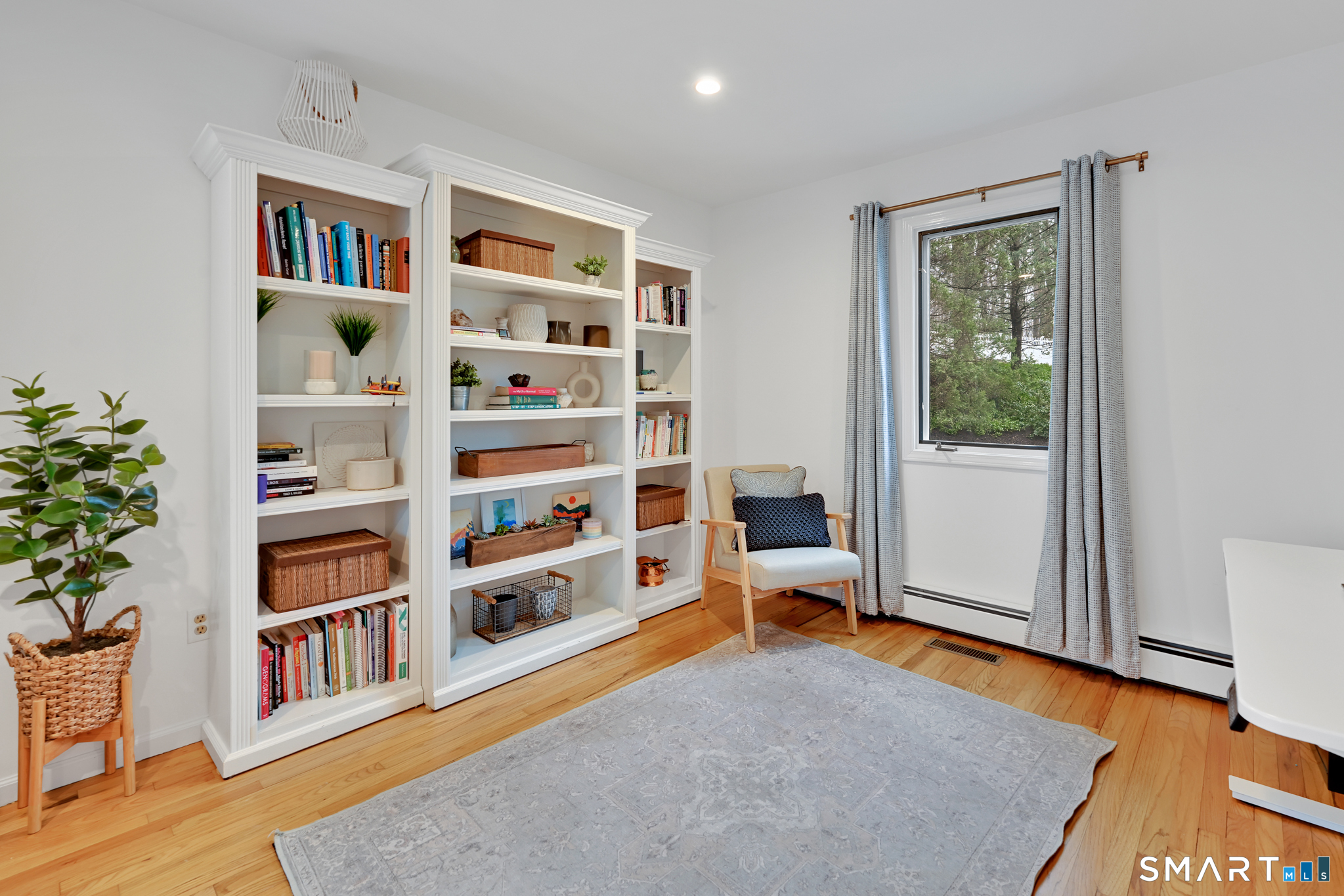 117 Settlers Farm Road Monroe, CT 06468 - Photo 5 of 40 The spacious living room has enough room to carve out an office area.