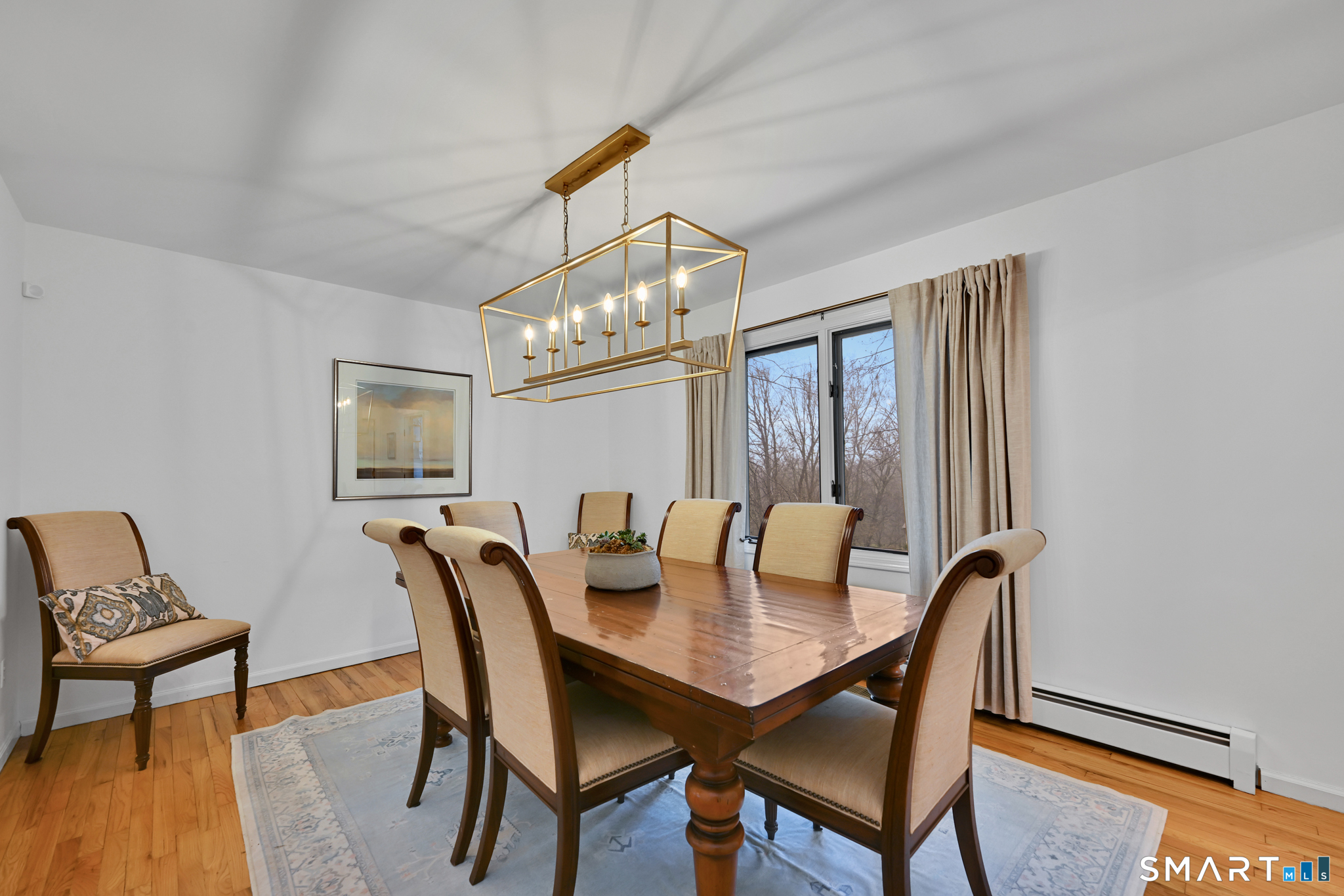 117 Settlers Farm Road Monroe, CT 06468 - Photo 6 of 40 The dining room is quite large, with gleaming hardwood floors that add warmth and elegance to the room.