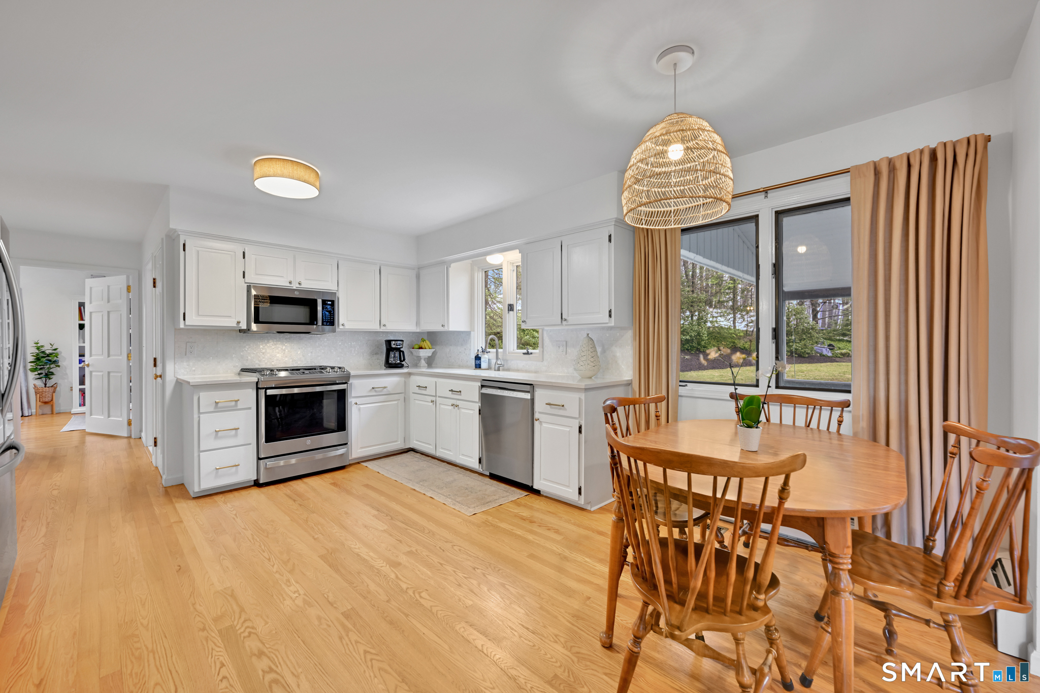 117 Settlers Farm Road Monroe, CT 06468 - Photo 10 of 40 Sunlight pours in through the two windows creating an inviting space.