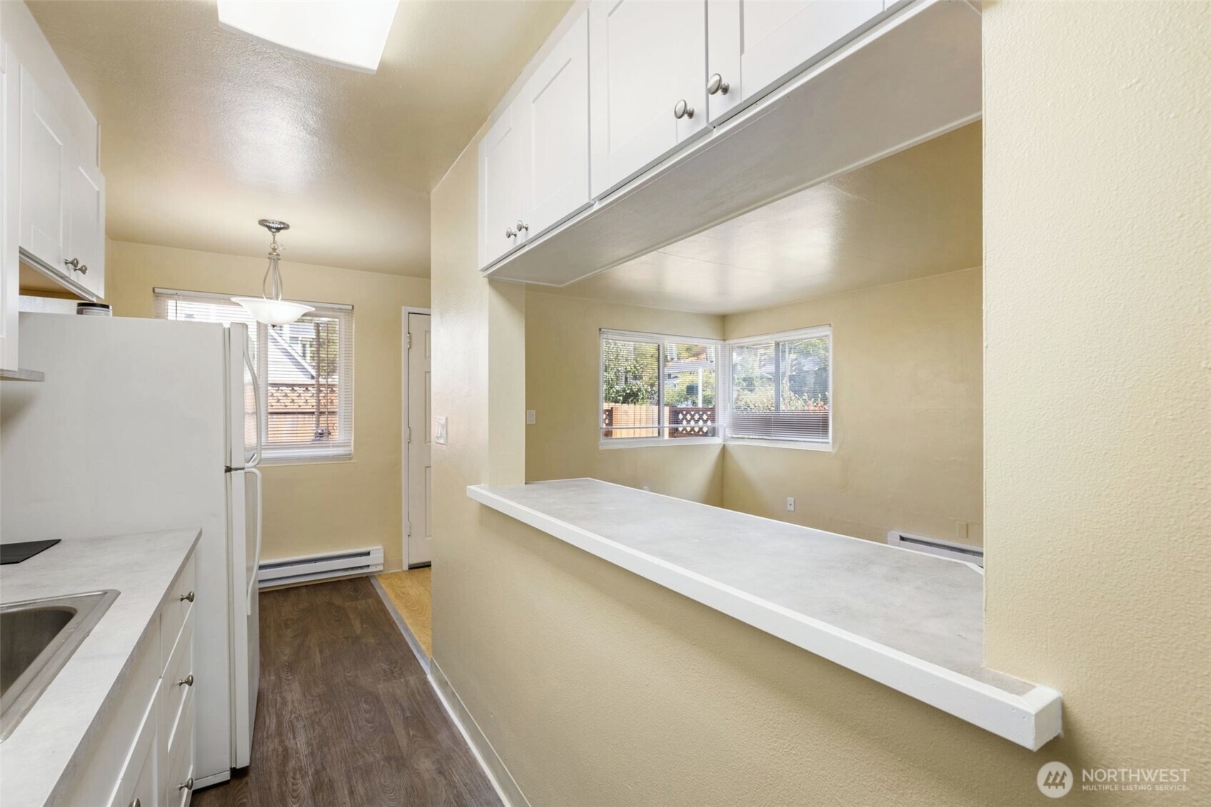 6705 Delridge Way Southwest Seattle, WA 98106 - Photo 14 of 21 a view of a big room with wooden floor
