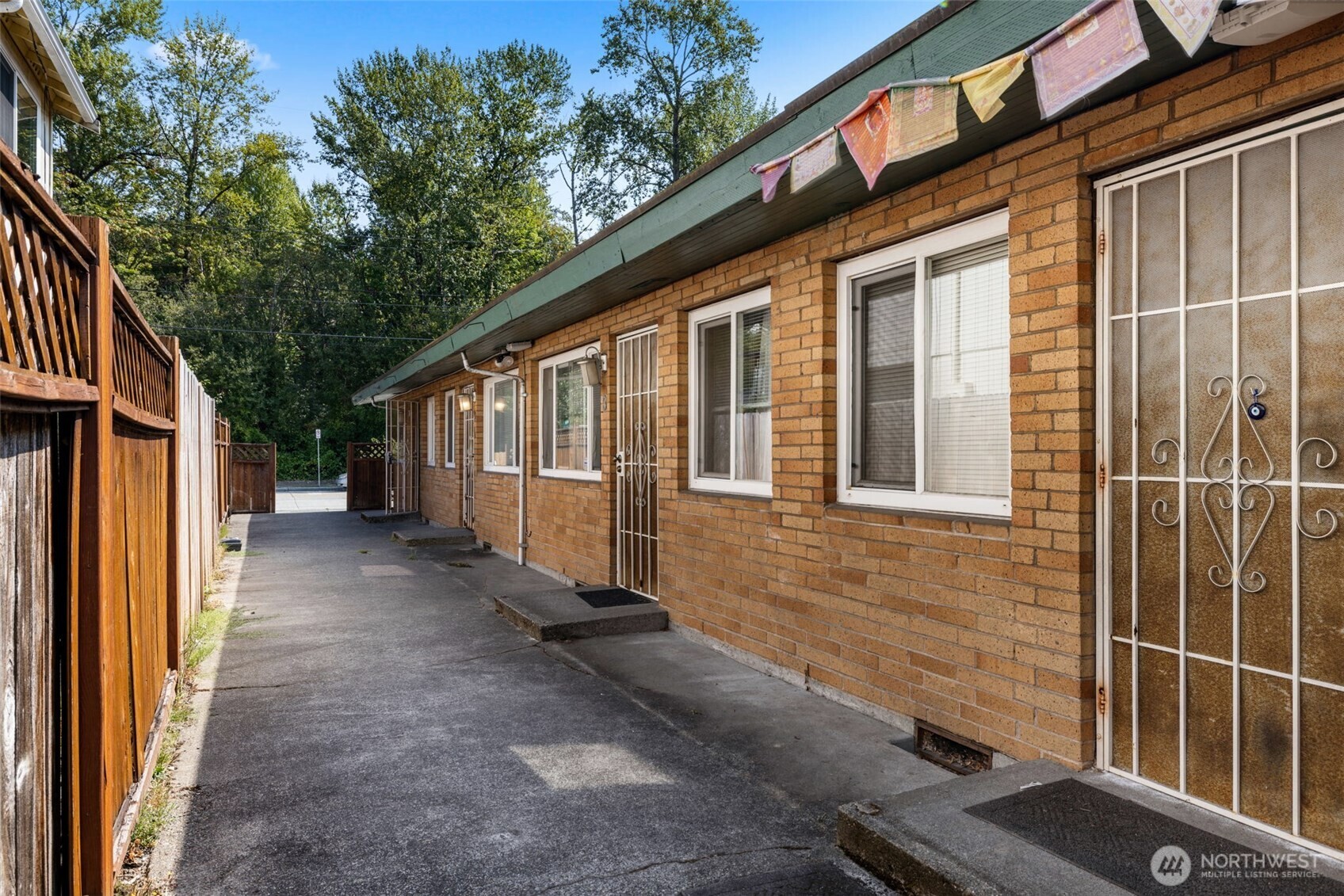 6705 Delridge Way Southwest Seattle, WA 98106 - Photo 19 of 21 a view of a house with backyard and sitting area