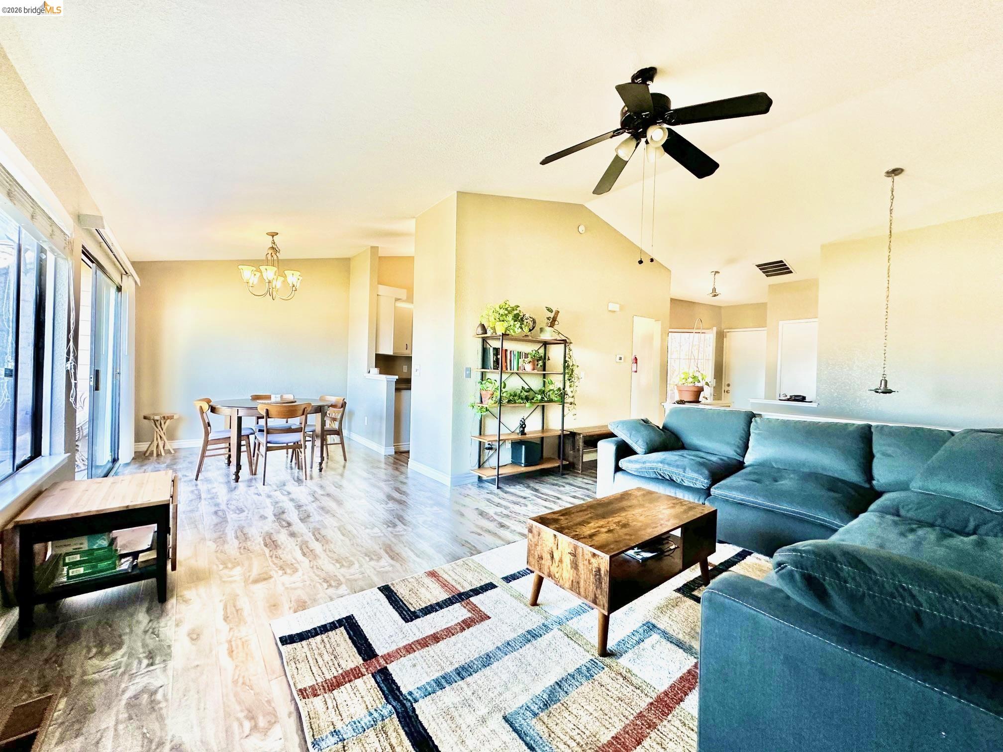222 Manuel Court Bay Point, CA 94565 - Photo 10 of 48 Open Living Room with Vaulted Ceilings and beautiful laminate flooring
