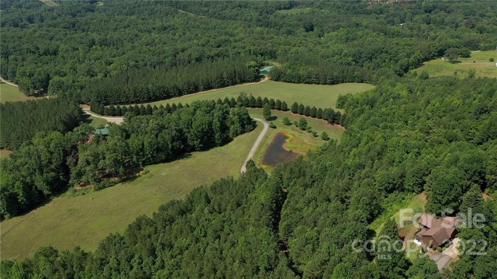 428 Smith Road Columbus, NC 28722 - Photo 3 of 48 a view of a house with a yard