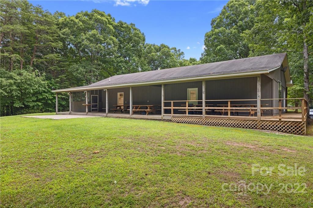 428 Smith Road Columbus, NC 28722 - Photo 44 of 48 a view of a house with a backyard