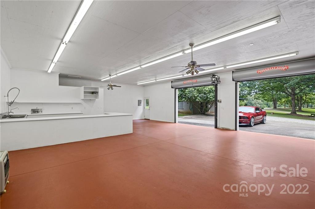 428 Smith Road Columbus, NC 28722 - Photo 45 of 48 a view of a couches and table in a room