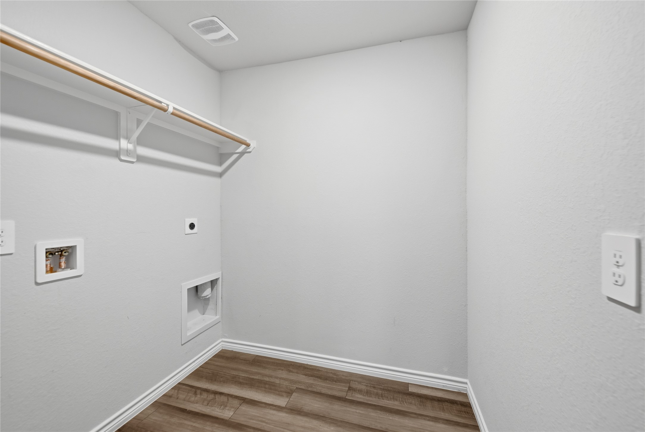 1010 Fannin Street Brenham, TX 77833 - Photo 16 of 30 a view of small space with racks on the wall