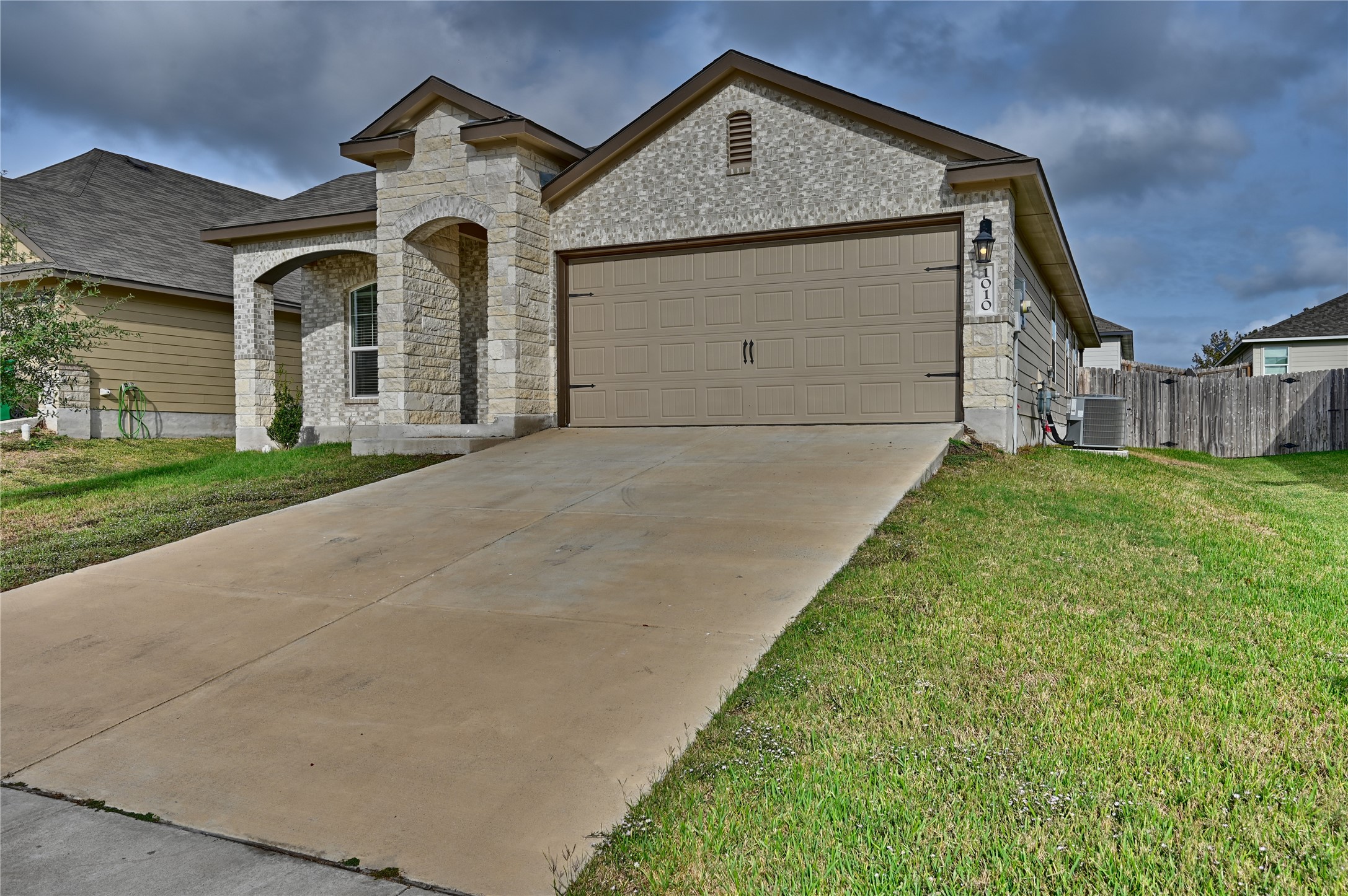 1010 Fannin Street Brenham, TX 77833 - Photo 3 of 30 a front view of a house with a yard