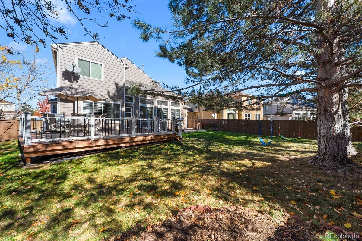 450 Bexley Lane Highlands Ranch, CO 80126 - Photo 36 of 41 a view of a house with a yard