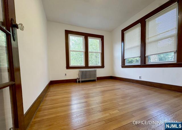 1156 High Mountain Road North Haledon, NJ 07508 - Photo 9 of 14 an empty room with wooden floor and windows