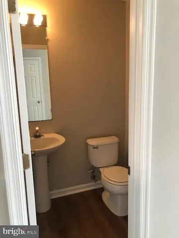 a bathroom with a sink and a toilet