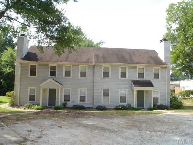3905 Lexington Drive, Unit A Raleigh, NC 27606 - Photo 1 of 1 a front view of a house with a yard