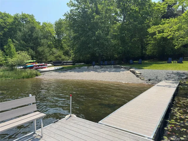 a view of a lake with a yard