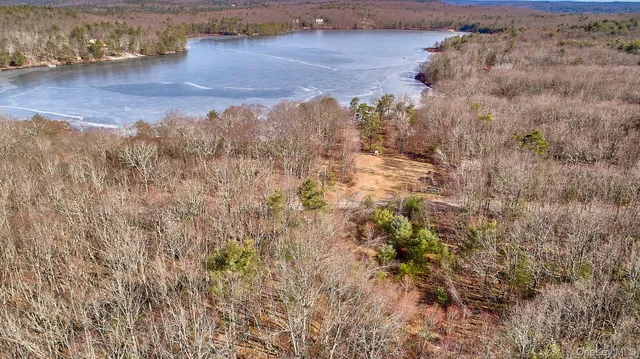 a view of lake with green space