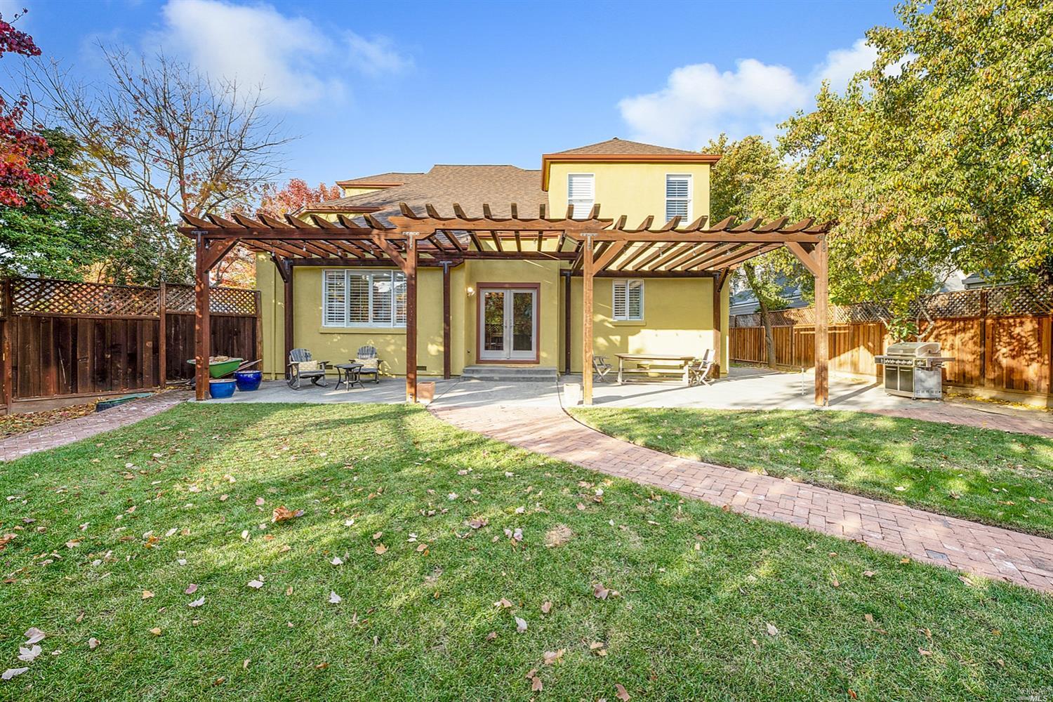 2330 Battersea Street Santa Rosa, CA 95403 - Photo 1 of 1 Perhaps one of the best things about this property is it's amazing yard. A spacious rare corner 7,256+/- SF lot that offers more yard in the back than in the front! With meandering brick pathways, fruit trees, beautiful pergola, room for gardening, lawn, room for a pool & large patio spaces the outside has something for everyone to enjoy. The patio even has a utility connection set up so the new owners could add a fabulous outdoor kitchen if they so please!