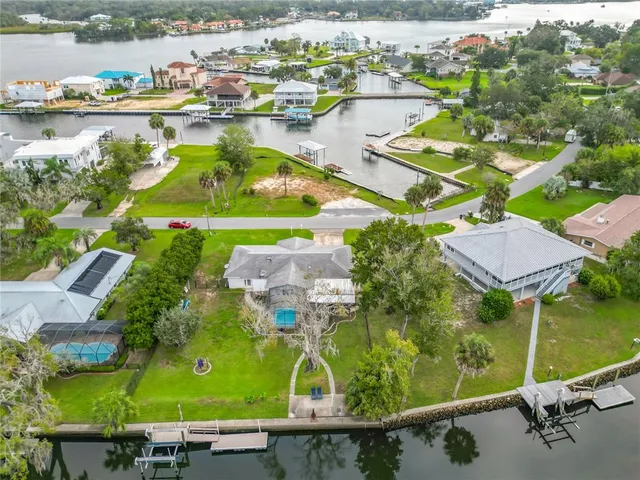 an aerial view of a residential houses and outdoor space