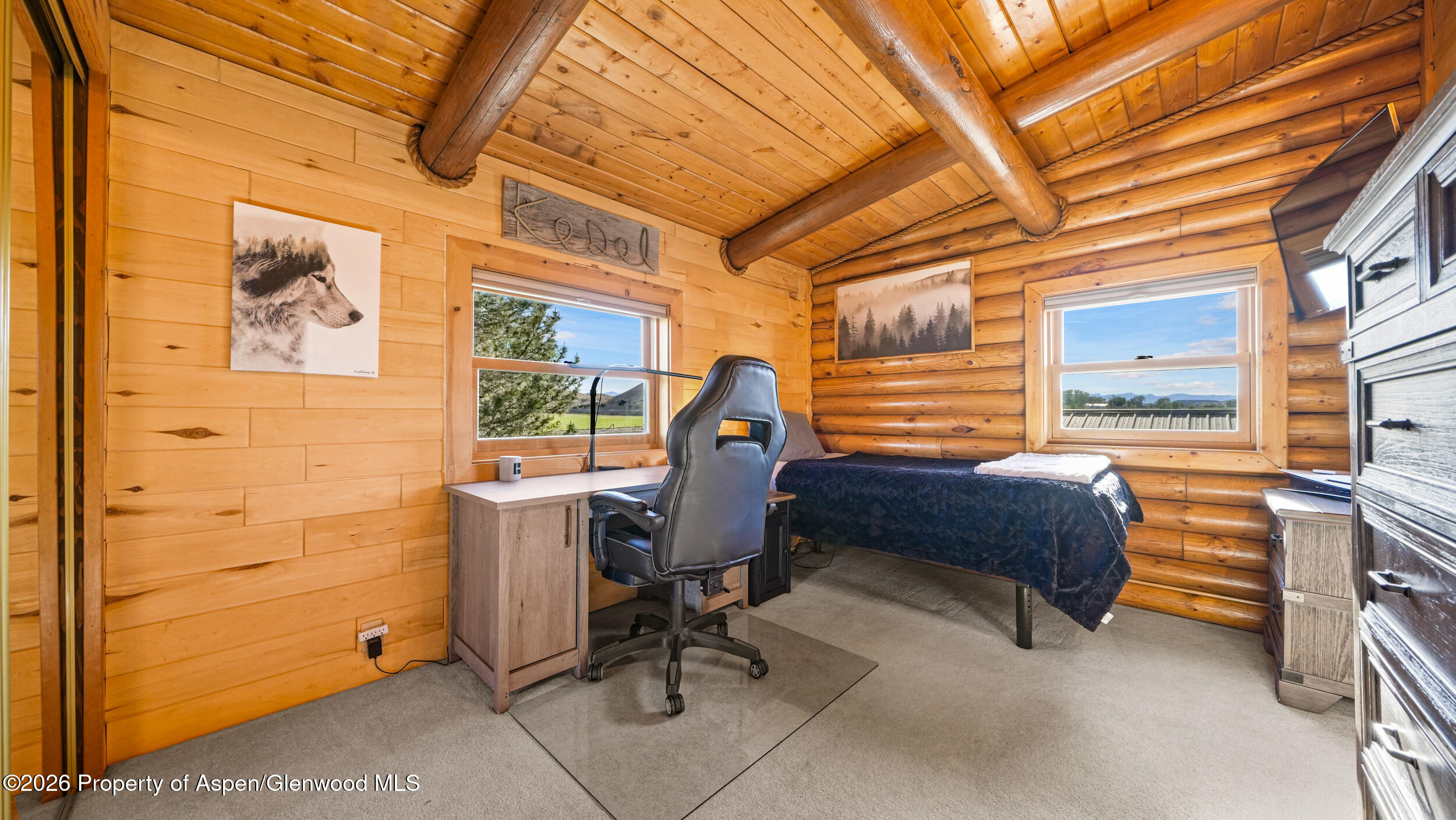 1355 N Road Loma, CO 81524 - Photo 29 of 51 a workspace with furniture and a window