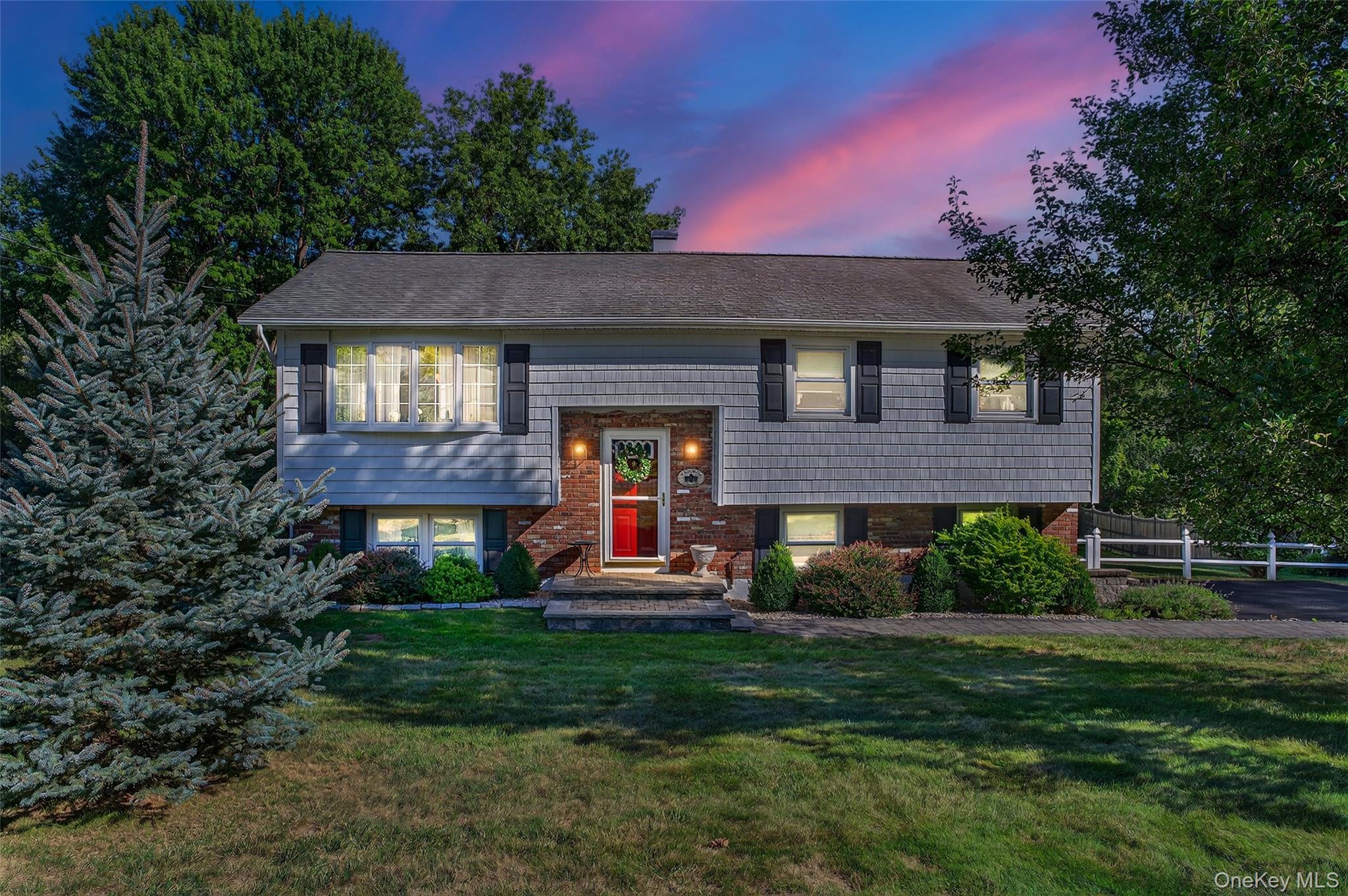 22 Bridle Lane Chester, NY 10918 - Photo 1 of 1 Split foyer home with brick siding and a chimney