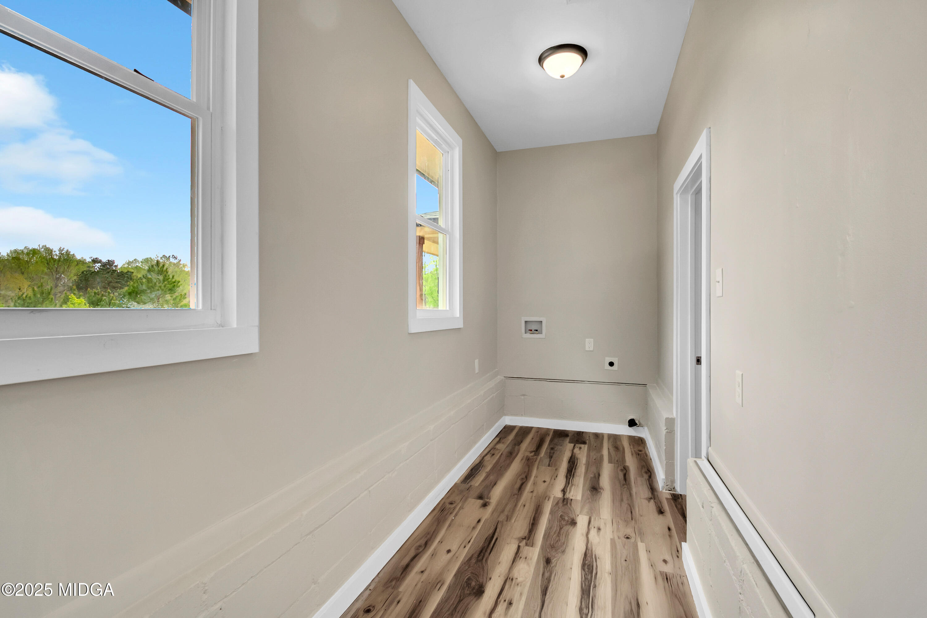 8738 Highway 87 Juliette, GA 31046 - Photo 27 of 36 a view of wooden floor and brick walls