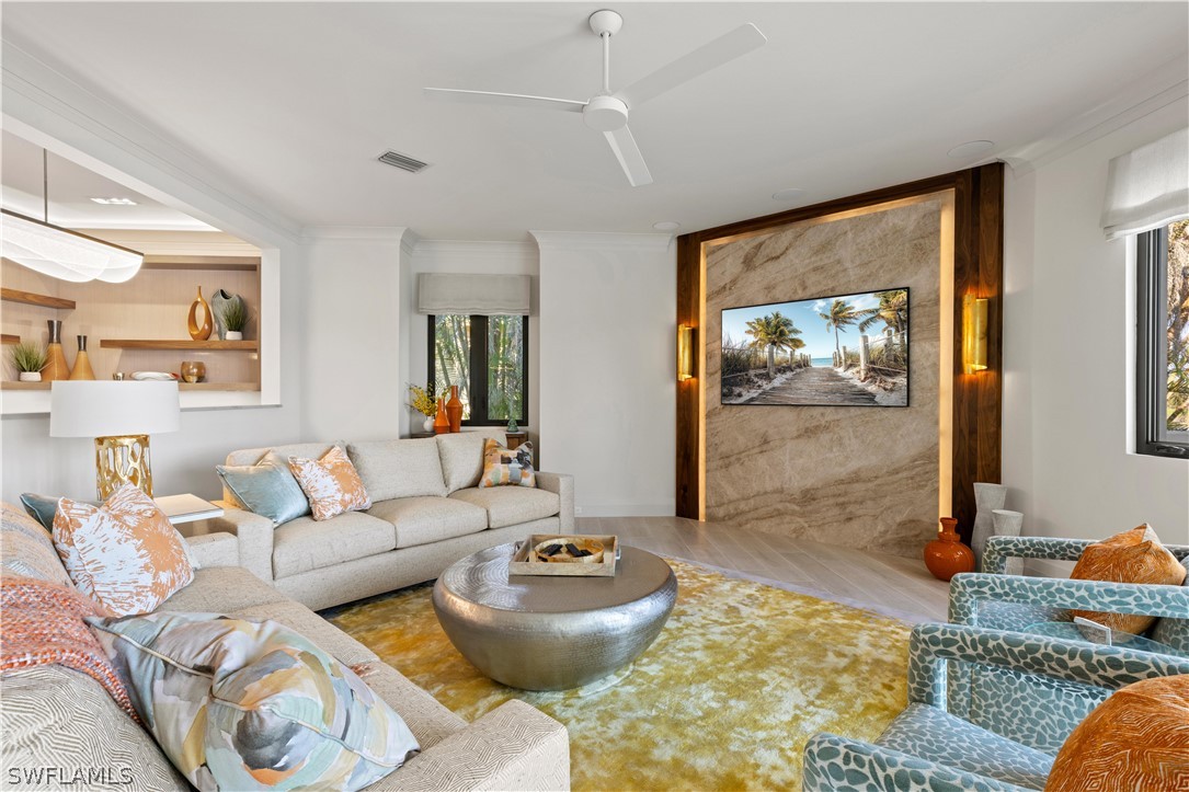 2564 Wulfert Road Sanibel, FL 33957 - Photo 11 of 50 a living room with furniture and a window