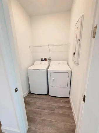 a utility room with dryer and washer