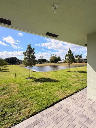 a view of a lake with a big yard