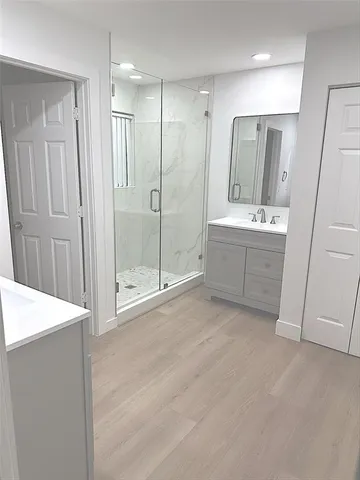 a view of an empty room with a sink