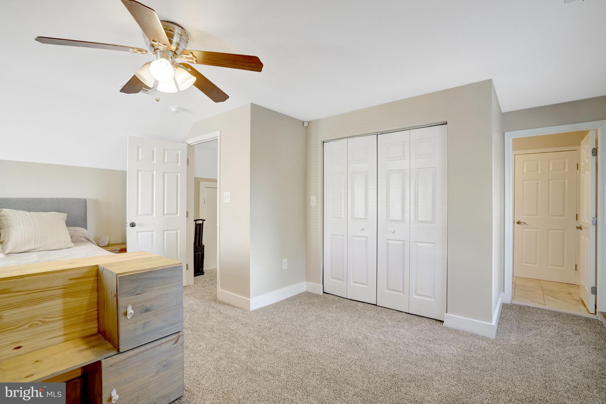 3107 Memorial Street Alexandria, VA 22306 - Photo 27 of 45 Primary closet and view towards ensuite bathroom