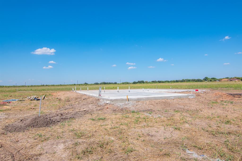 121 Gunner Trail Early, TX 76802 - Photo 3 of 5 a view of an ocean and beach